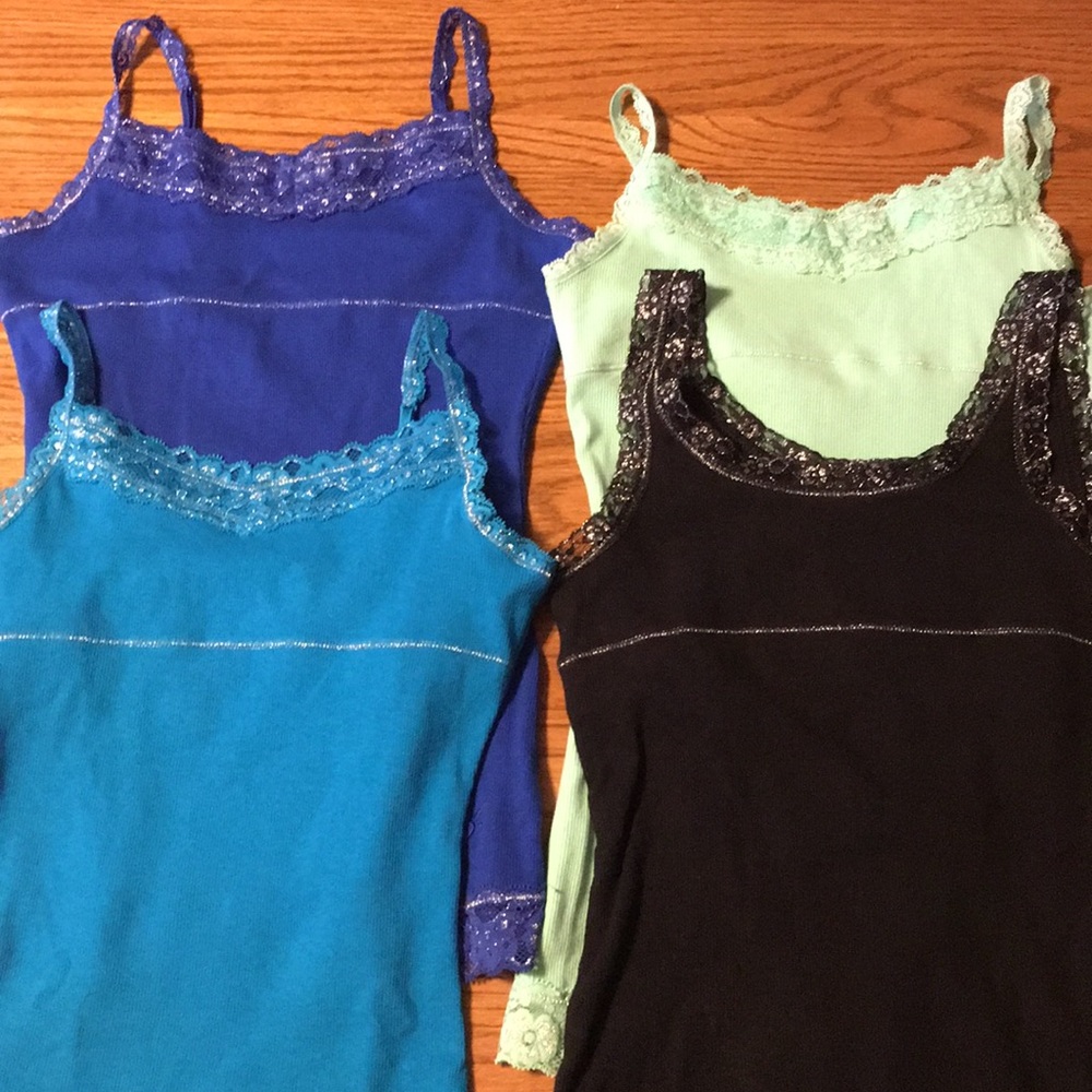 Lot of 4 Justice tank tops.